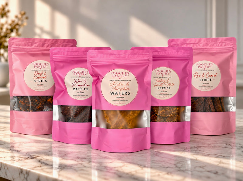 The Whole Pantry: all five Pooches Pantry treat bags on a marble bench